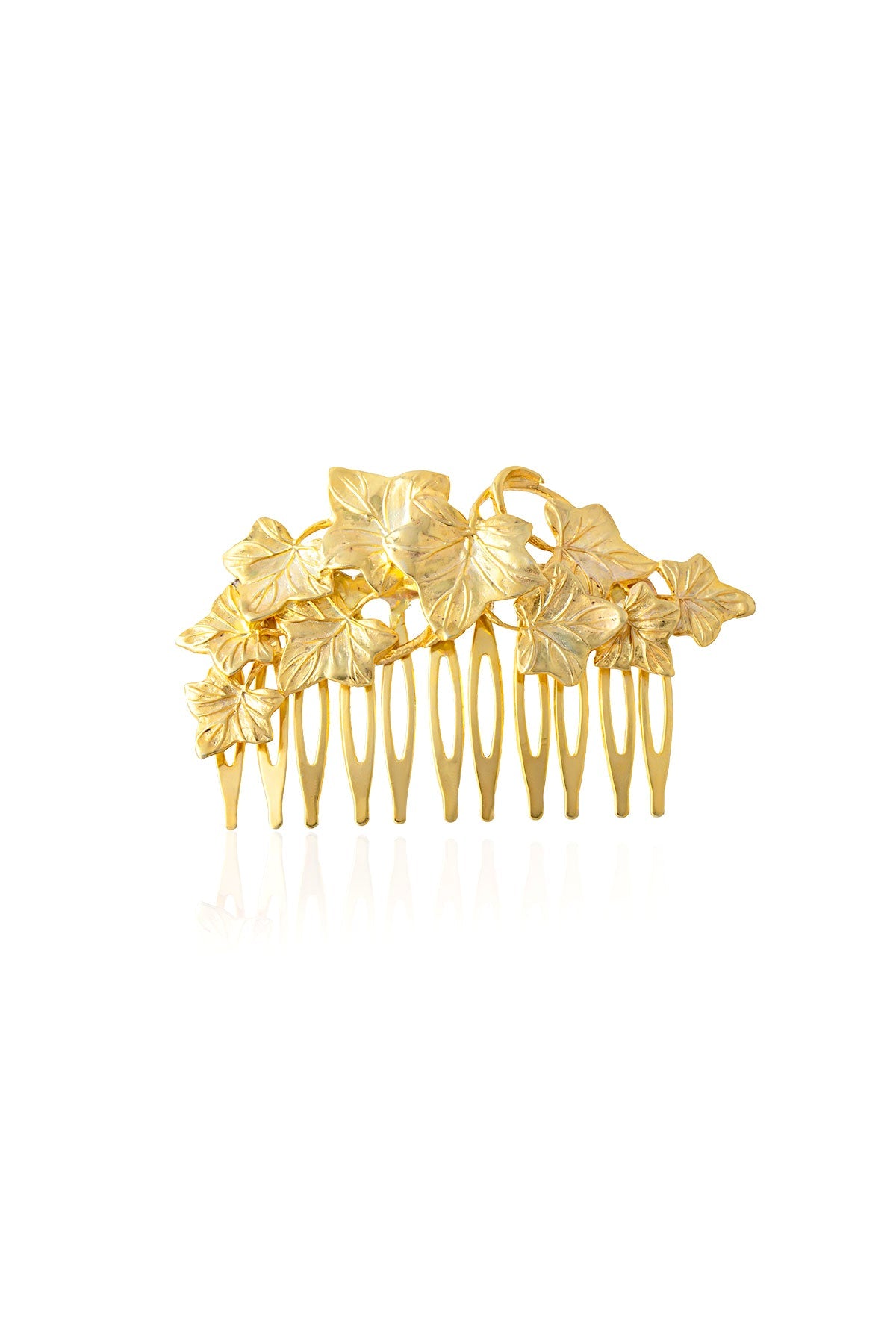 A 24k gold plated bronze hair comb with floral details.