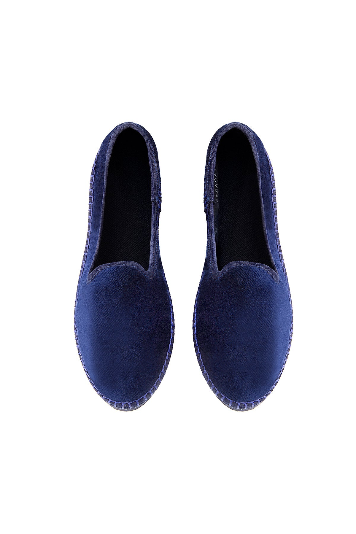 Pair of blue loafers on a white background