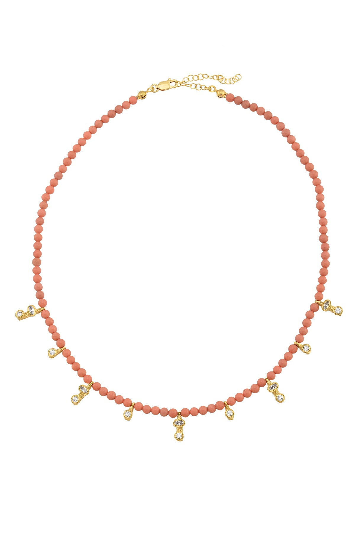 A gold-plated necklace with rose quartz stones and small gold charms, displayed against a white background.