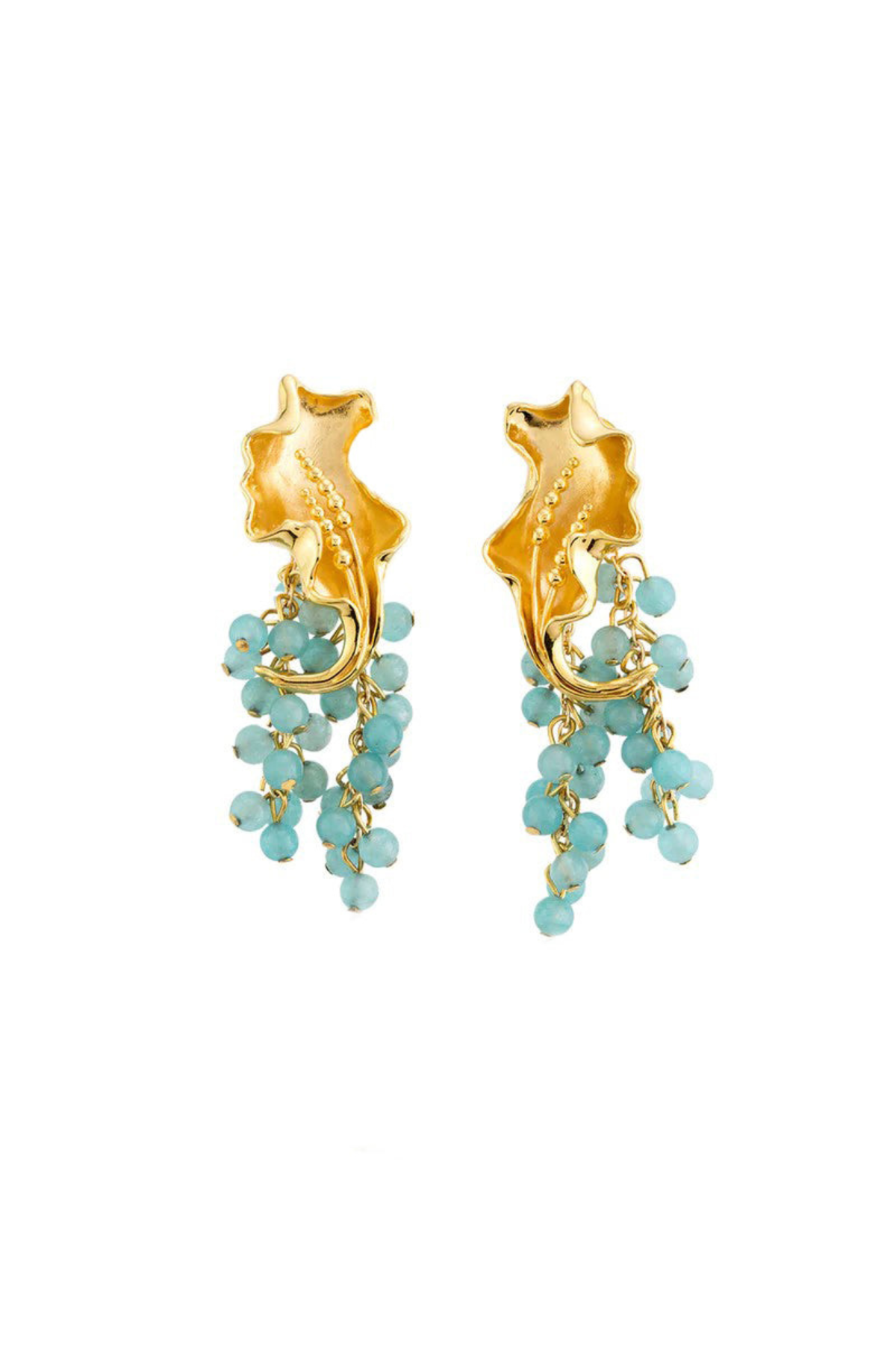 Gold earrings with turquoise beads on a white background