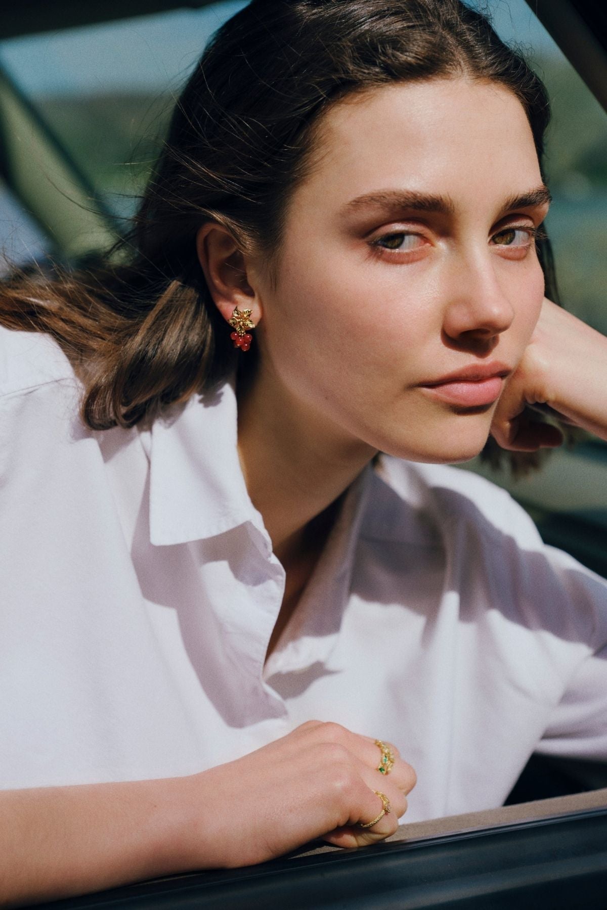 Woman wearing a white shirt with a blurred background