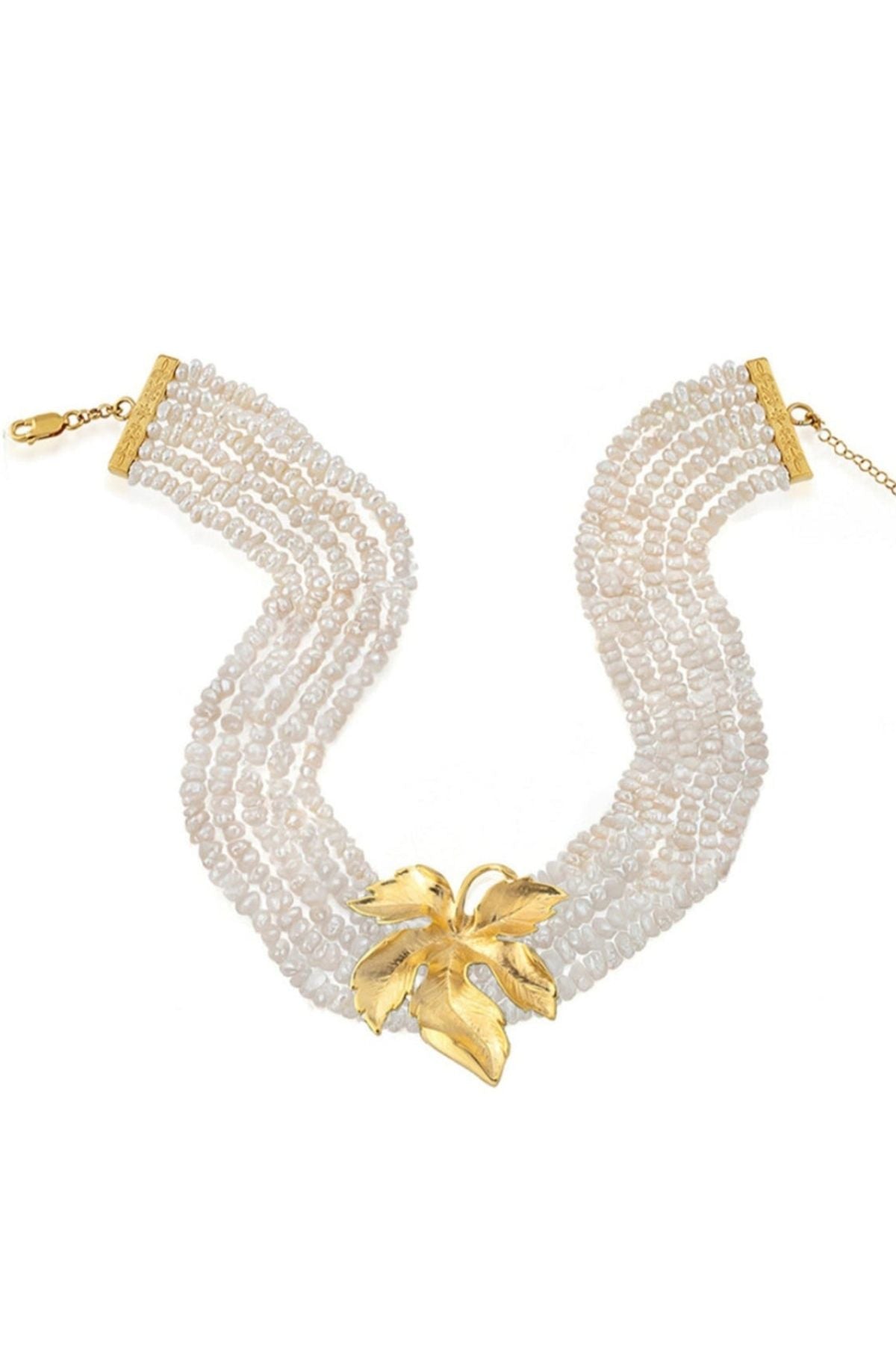 Pearl necklace with gold accents on a white background