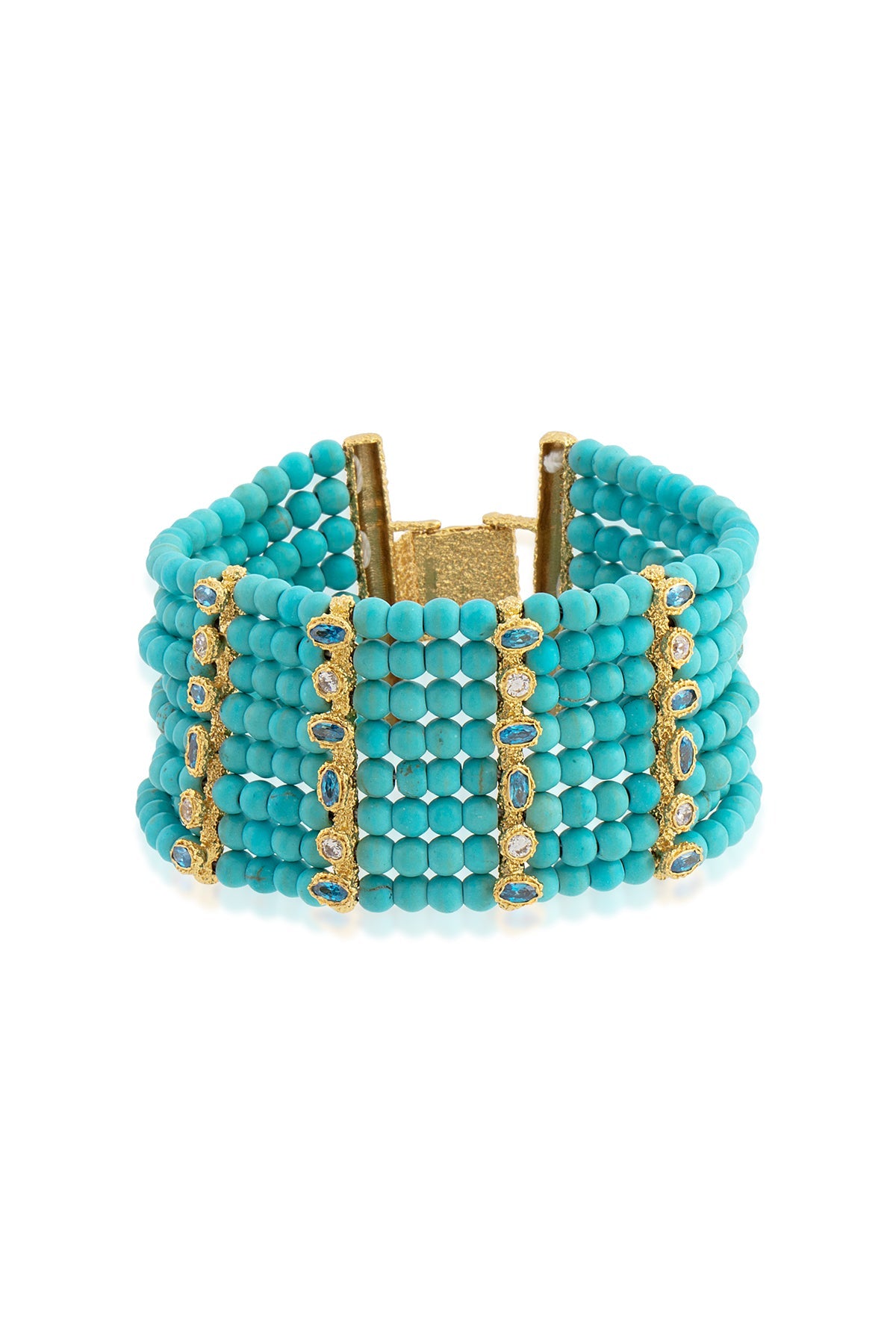 A bracelet with gold plating and blue chalchuite stones, featuring Swarovski crystals, and a gold clasp.