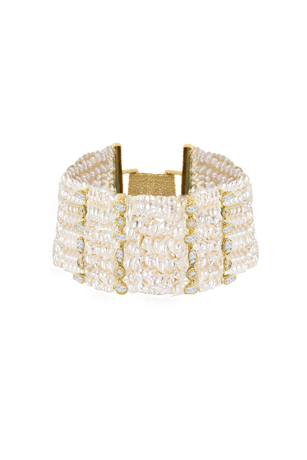 Pearl and gold beaded bracelet on a white background