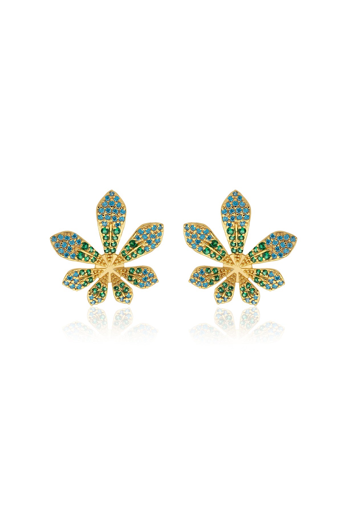 Gold leaf-shaped earrings with green gemstones on a white background