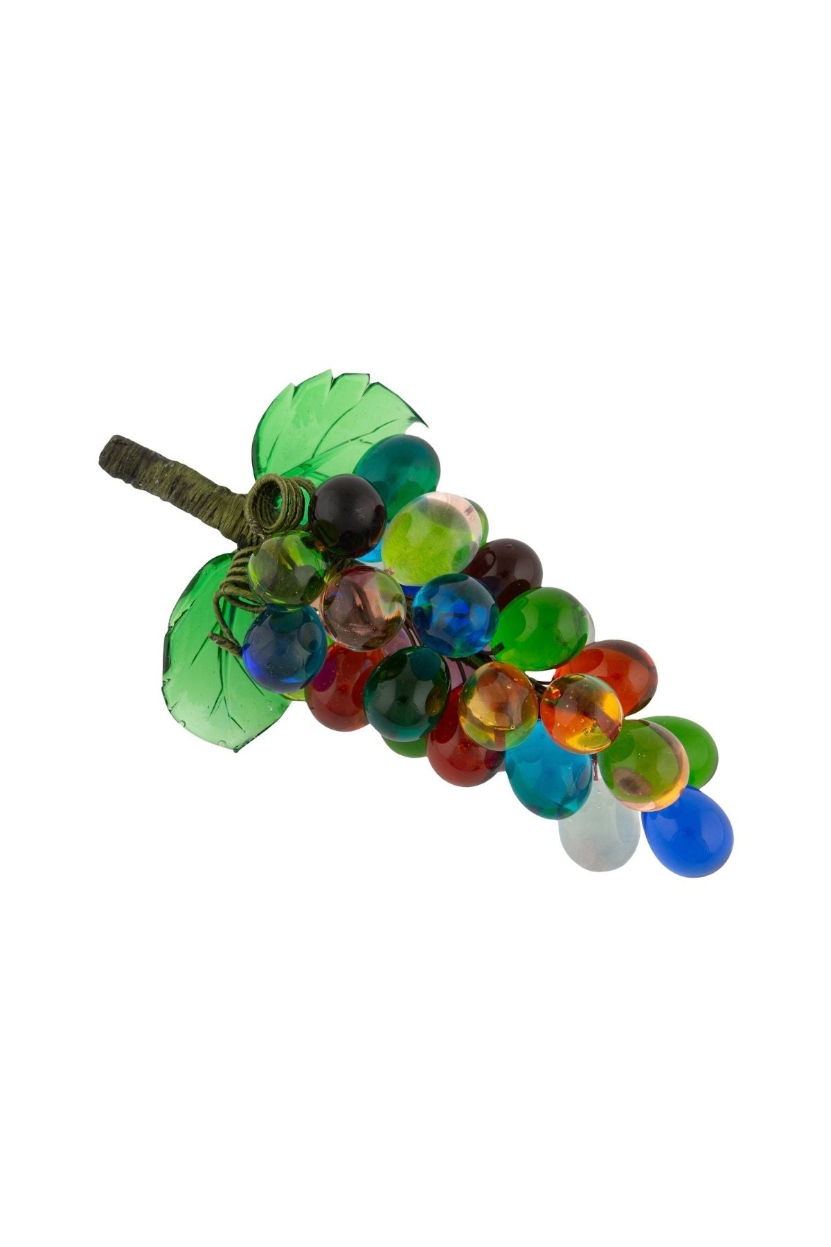 A decorative art glass piece resembling a bunch of multicolored grapes with green leaves on a white background.